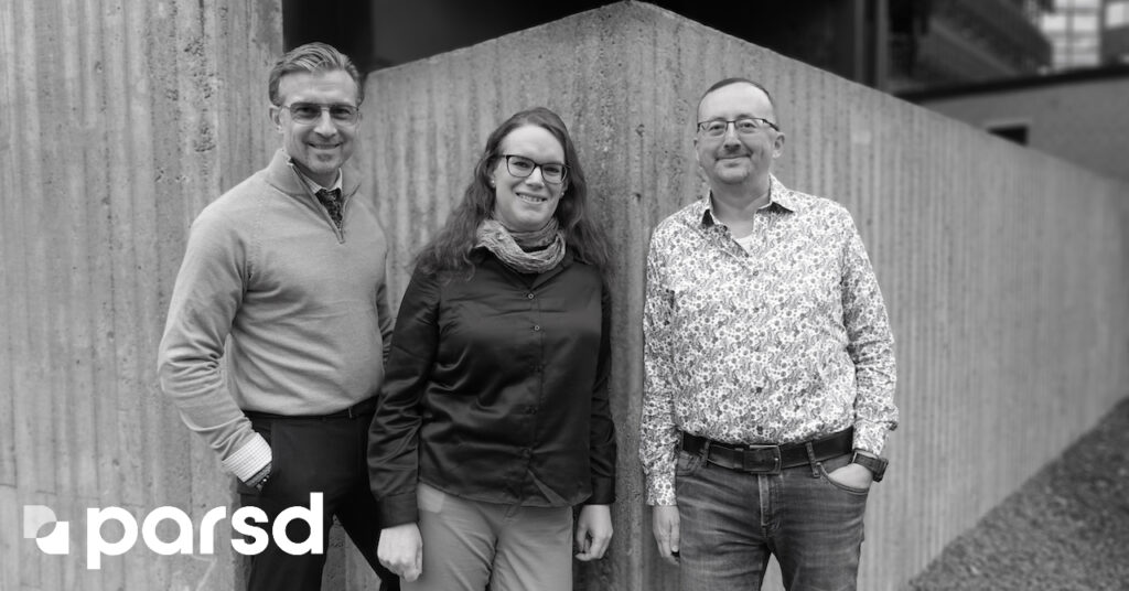 David, Alexandra and Håkan in front of the A House building